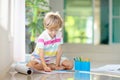 Child drawing. Kid painting rainbow Royalty Free Stock Photo