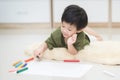 Child drawing picture with crayon Royalty Free Stock Photo