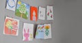 Child drawings hanging on the wall, preschool child painting, kids room, Children`s creativity, empty space Royalty Free Stock Photo