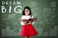 Child with Dream Big text in class Royalty Free Stock Photo