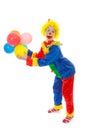 Child dressed as colorful funny clown