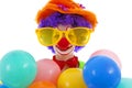 Child dressed as colorful funny clown Royalty Free Stock Photo