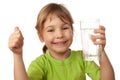 Child drink water from glass container Royalty Free Stock Photo