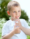 Child drinking pure water Royalty Free Stock Photo