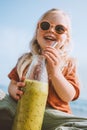 Child drinking smoothie with glass bottle healthy lifestyle vegan detox breakfast