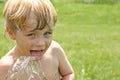 Child Drinking Water from Hose Royalty Free Stock Photo