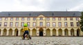 A child drive with his bike in front of the new university building in the city of Siegen Royalty Free Stock Photo