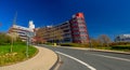 A child drive with his bike in front of the new university building in the city of Siegen, resubmission = 1 Royalty Free Stock Photo