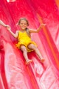 Child drives off high inflatable trampoline