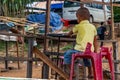 Child driving a Boat Laos Royalty Free Stock Photo