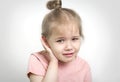 Child with earache, toddler girl portrait ear pain concept