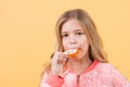 Child eat candy on stick, food Royalty Free Stock Photo