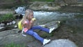 Child Eating Apples by River, Kid in Camping, Mountains View, Girl Eats Fruits