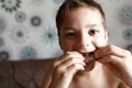 Child eating bread with chocolate butter Royalty Free Stock Photo