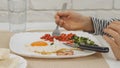 Child Eating Breakfast in Kitchen, Kid Eats Healthy Food Eggs, Girl Vegetables Royalty Free Stock Photo