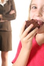 Child eating brownie upclose - Royalty Free Stock Photo