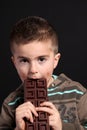 Child eating a chocolate bar Royalty Free Stock Photo