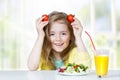 Child eating organic healthy food have a fun. Royalty Free Stock Photo
