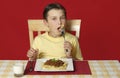 Child eating pasta Royalty Free Stock Photo