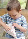 Child eating popcorn outdoor Royalty Free Stock Photo