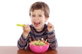 Child eating salad