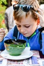Child eating a soup Royalty Free Stock Photo