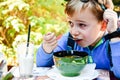 Child eating a soup Royalty Free Stock Photo
