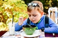 Child eating a soup Royalty Free Stock Photo