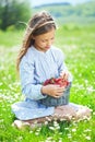 Child eating strawberries in a field Royalty Free Stock Photo