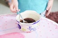 Child eating sweets pudding desert chocolate cake young kid girl with spoon and dish unhealthy Royalty Free Stock Photo