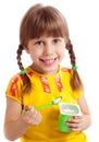 Child eating yogurt Royalty Free Stock Photo