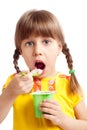 Child eating yogurt Royalty Free Stock Photo