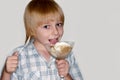 Child eats ice-cream Royalty Free Stock Photo