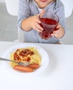 The child eats spaghetti lunch. Selective focus. Royalty Free Stock Photo