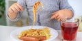 The child eats spaghetti lunch. Selective focus. Royalty Free Stock Photo