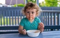 Child eats spaghetti pasta. Selective focus. Royalty Free Stock Photo