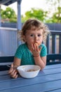 Child eats spaghetti pasta. Selective focus. Royalty Free Stock Photo