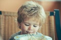 The child eats spaghetti. Tasty lunch for kids. Italian food. Royalty Free Stock Photo