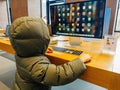 Child Exploring Apple Store Display Royalty Free Stock Photo