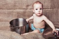 Child exploring a pan