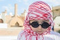 Child face in head kerchief