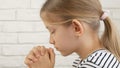 Child Face Praying Before Eating, Kid in Kitchen, Girl Portrait Meditating Royalty Free Stock Photo