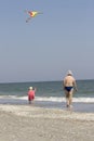 Child and father at the sea side Royalty Free Stock Photo