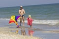 Child and father at the sea side Royalty Free Stock Photo