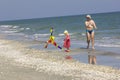 Child and father at the sea side