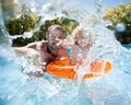 Child with father in swimming pool Royalty Free Stock Photo