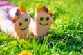 Child feet on the grass drawing a smile. Selective focus. Royalty Free Stock Photo