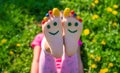 Child feet on the grass drawing a smile. Selective focus. Royalty Free Stock Photo