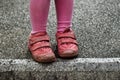 Child feet on old stone block Royalty Free Stock Photo