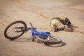 Child fell off the bike. Bicycle accident. Bicycle injury. Road safety and children Royalty Free Stock Photo